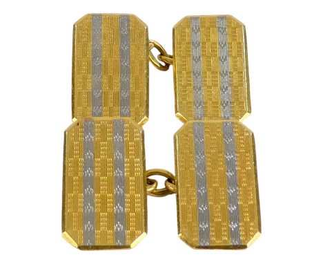 A pair of 18ct gold cufflinks - rectangular with canted corners, engine turned with a 'white' stripe, weight 10g.
