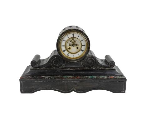 A large late 19th century slate mantel clock - with a visible escapement, the white enamel dial set out in Roman numerals and