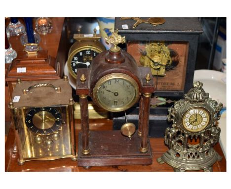 Group of six assorted clocks to include a mahogany-cased example by Elliott, a Gravity clock, portico clock and an American m