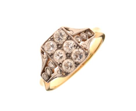 Yellow metal and diamond dress ring, set with two rows of three diamond brilliants within diamond-set shoulders, shank stampe