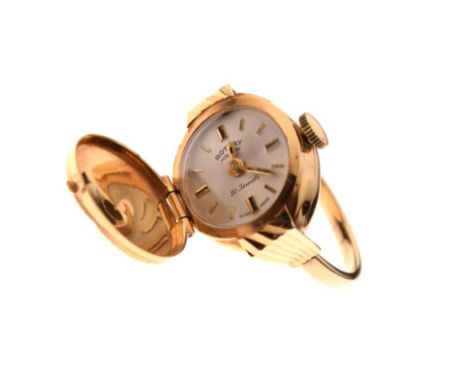 Rotary - Yellow metal dress ring-watch, the hinged cover enclosing silvered dial with baton hour markers inscribed Rotary 21 