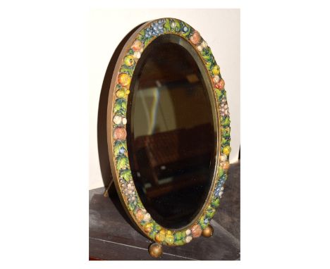 20th Century Italian Barbola-style easel dressing table mirror of oval form with bevelled plate and carved painted fruit surr