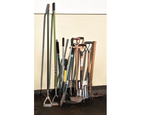 Assorted garden tools to include; electric strimmer, spades, forks, rakes etc  