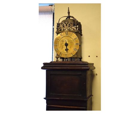 Old reproduction brass lantern clock, the dial inscribed Thos. Moore, Ipswich, having an antique oak case, the clock measurin