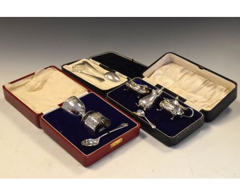 George V cased silver three piece condiment set, Birmingham 1926/31, an Edward VIII silver christening set comprising: egg cu