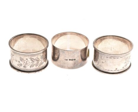Pair of George VI silver napkin rings, Birmingham 1939, together with a George VI silver napkin ring, Sheffield 1944, 1.8toz 