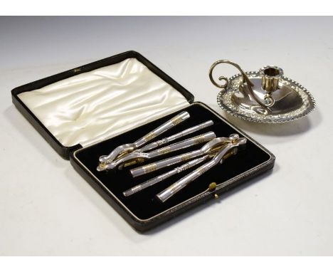 Silver-plated chamber candlestick with heart-shaped tray, together with a cased nut cracker and pick set (2)  