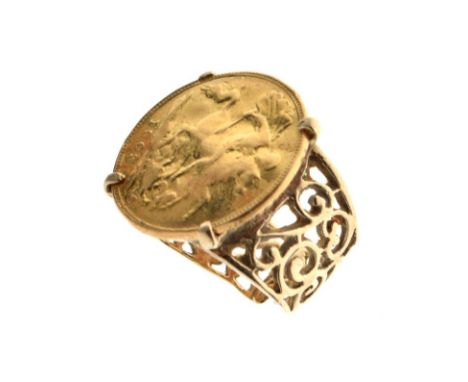 Edward VII half sovereign 1902, on unmarked yellow metal ring mount of open scroll design, size J, 7.9g approx  