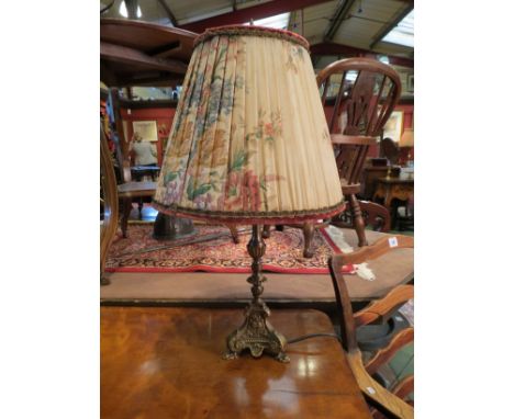 A Victorian style brass table lamp with floral pattern shade, 61cm tall