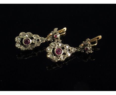 A pair of old cut diamond and ruby drop earrings, backs stamped 500