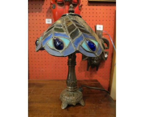 A Tiffany style table lamp with multi-coloured shade, 30cm tall