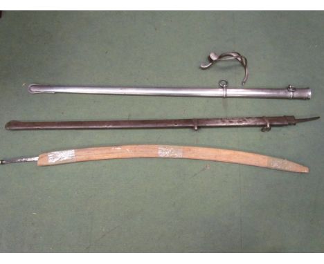 Two 19th Century sword blades and a spare scabbard