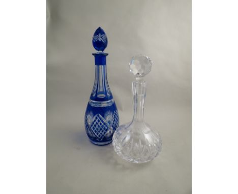 A blue Bohemian glass decanter with another