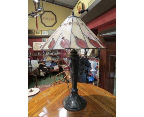 A Tiffany style table lamp with cream and red shade, 60cm tall