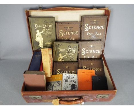 A vintage suitcase containing a quantity of hardback books on art, science, history and similar.