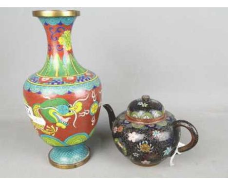 A cloisonné vase with depiction of a dragon chasing the flaming pearl and a cloisonné teapot with floral decoration against a