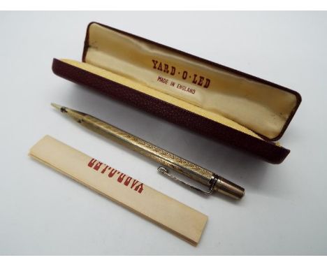 A Yard O Led hallmarked silver propelling pencil with engine turned decoration, London assay and sponsors mark for Johnson, M