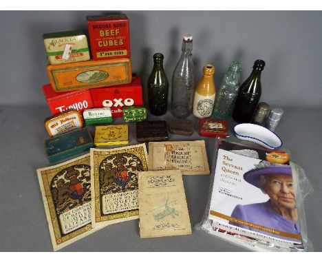 A mixed lot to include cigarette card albums, Royal commemorative, vintage tins and bottles and similar.