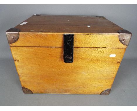 A vintage metal bound chest, approximately 37 cm x 45 cm x 38 cm.