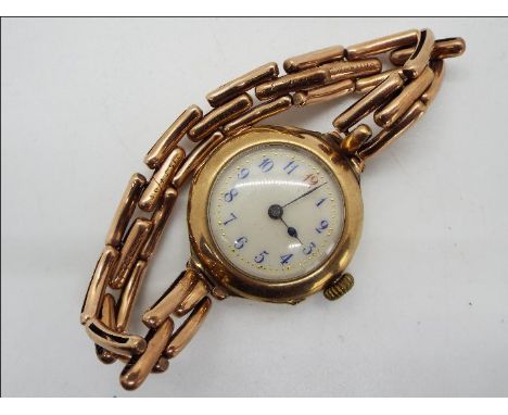 A lady's 9ct gold cased wristwatch on expanding 'Britannic' bracelet, the case back interior stamped 9c, Arabic numerals to a