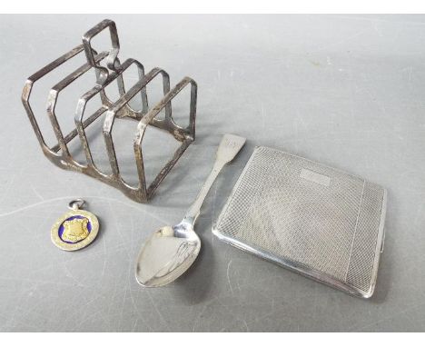 A small collection of hallmarked silver items comprising a George VI cigarette case, Birmingham assay 1939, silver gilt and e