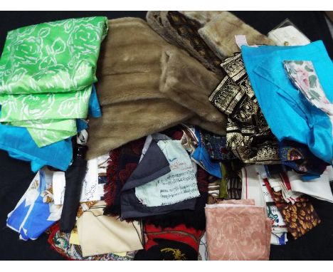A collection of lady's vintage clothing, fur coat by Tissavel, silk scarves, tea towels, cosmetic bag, fabric and similar.