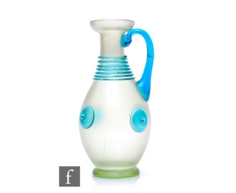 Loetz - An early 20th Century 'Orpheus' ewer of baluster footed form with dished flared rim and loop handle, Olympia ground w