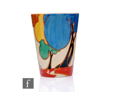 Clarice Cliff - Blue Autumn - A beaker circa 1930, hand painted with a stylised tree and cottage landscape with orange bandin