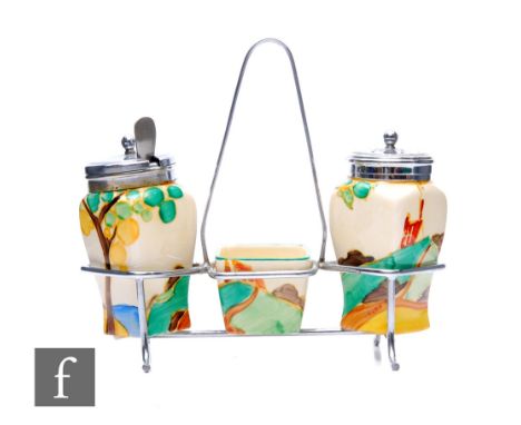 Clarice Cliff - Secrets - A condiment set circa 1932, comprising salt, pepper and mustard with chrome plated mounts all to a 