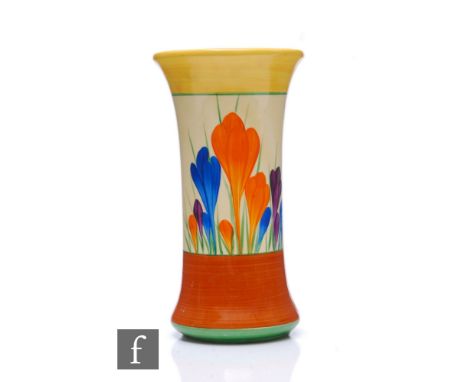 Clarice Cliff - Crocus - A shape 204 waisted sleeve vase circa 1930, hand painted with large Crocus sprays between yellow, gr