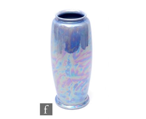 Ruskin Pottery - A lavender lustre vase of shaped rolling pin form with everted rim, mottled lavender/green and iridescent gl