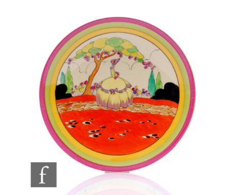 Clarice Cliff - Applique Idyll - A circular dish form plate circa 1933, hand painted with a Crinoline lady to a garden settin