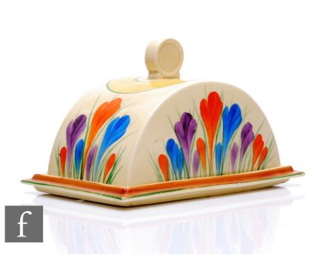 Clarice Cliff - Crocus - A Bon Jour shape butter dish circa 1933, hand painted with large Crocus sprays with yellow, green an