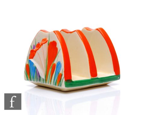 Clarice Cliff - Crocus - A small Daffodil shape toast rack circa 1933, hand painted with Crocus sprays and orange and green b