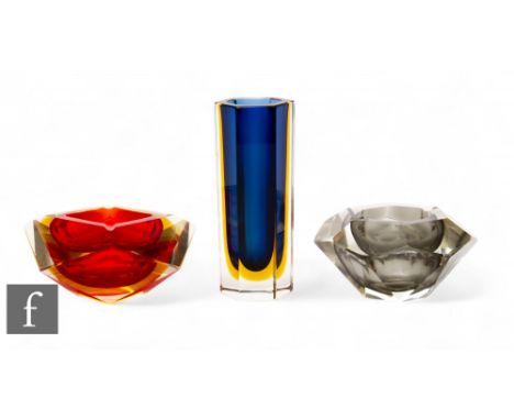 In the manner of Mandruzatto - A Murano sommerso glass vase of hexagonal form, the blue core cased in amber and clear, height