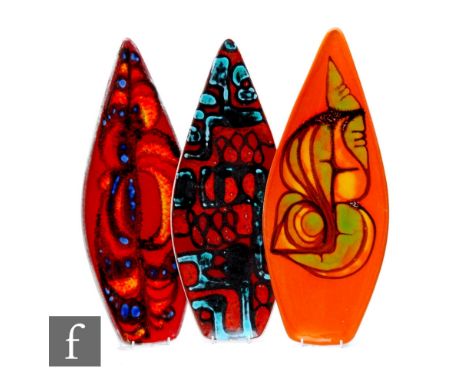 Poole Pottery - A Delphis pattern spear head dish, stylised abstract design over orange ground, length 44cm, together with tw