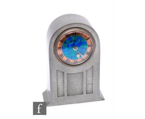 David Veasey - Liberty and Co - An Arts and Crafts Tudric pewter and enamelled dial mantle timepiece, circa 1900, domed with 