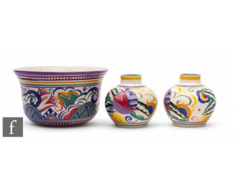 Carter Stabler Adams (Poole Pottery) - A pair of 1930s red bodied shape 309 vases, decorated in the TP pattern, impressed and