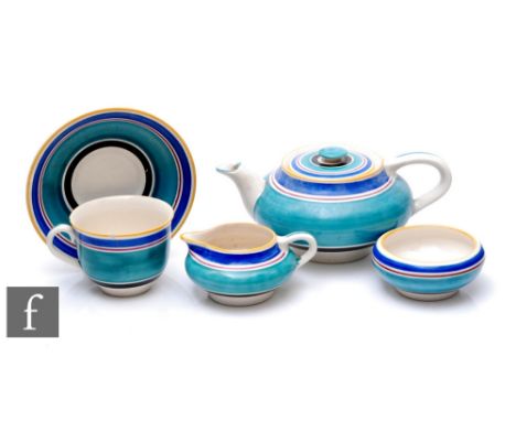 Susie Cooper - Grays Pottery - An Art Deco hand painted part teaset, decorated with concentric bands in teal, red, blue, yell