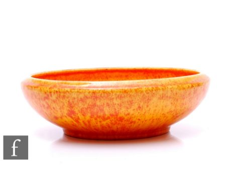 Royal Lancastrian - A shape 3246 bowl of circular form with inverted rim, mottled orange vermillion orange peel glaze, impres