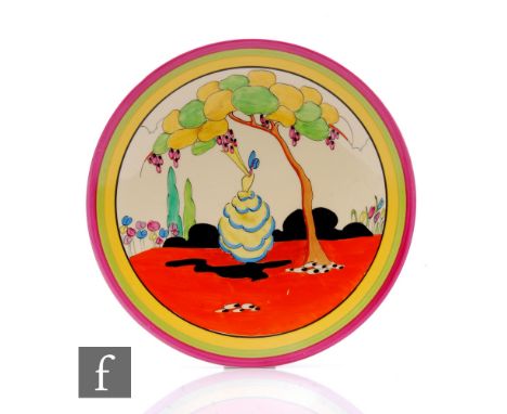 Clarice Cliff - Applique Idyll - A circular dish form plate circa 1931, hand painted with a Crinoline lady to a garden settin
