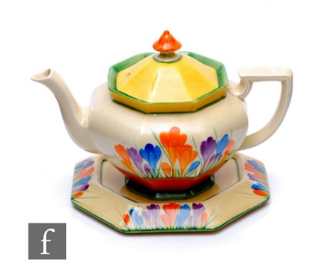 Clarice Cliff - Crocus - An Athens shape teapot circa 1930, hand painted with sprays of flowers and foliage between yellow, b