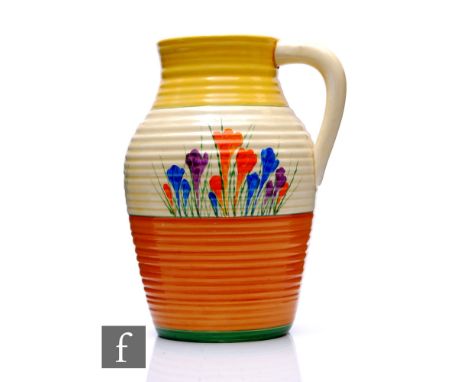Clarice Cliff - Crocus - A single handled Lotus jug circa 1930, hand painted with Crocus sprays between yellow, green and bro
