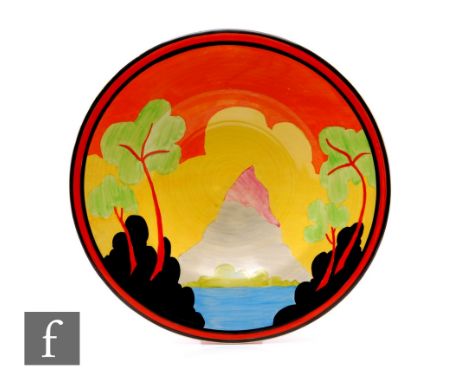Clarice Cliff - Applique Etna - An 18 inch ribbed charger circa 1930, hand painted with a stylised landscape with trees to th