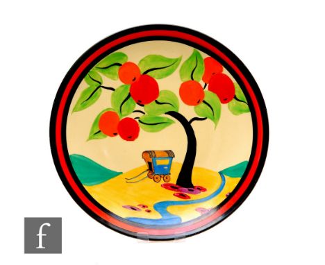 Clarice Cliff - Applique Caravan - A 13 inch wall plaque circa 1931, hand painted with a caravan to a hill below a fruiting t