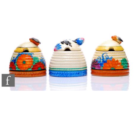 Clarice Cliff - Gay Day - A small size Bee Hive honey pot circa 1931, hand painted with stylised flowers and foliage between 