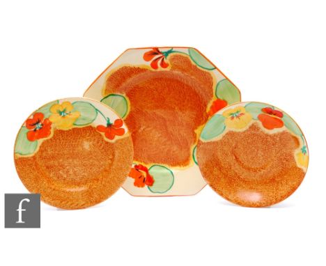 Clarice Cliff - Nasturtium - A large octagonal plate circa 1933, hand painted with stylised flowers and foliage over a stippl