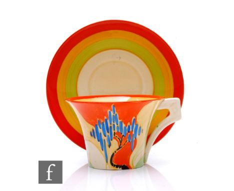Clarice Cliff - Windbells - A Daffodil shape tea cup and saucer circa 1933, hand painted with a stylised tree and flower land