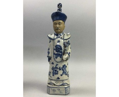 CHINESE CERAMIC FIGURE OF AN OFFICIAL,modelled in dragon robe and bearing ruyi sceptre, 31.5cm high, together with two Chines