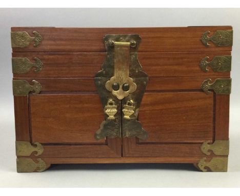 CHINESE CAMPHORWOOD BOX,probably for mahjong, twin-handled and brass bound with shou character to top, 35.5cm wide
